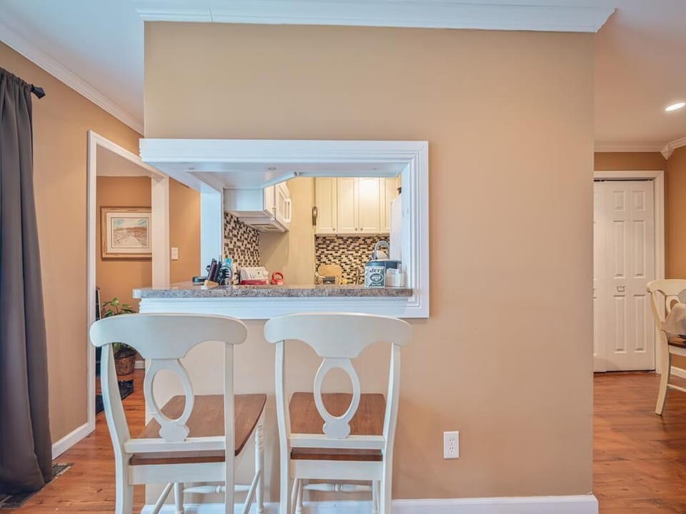 Enjoy the open layout opening up to a modern kitchen, perfect for culinary adventures and casual catch-ups.