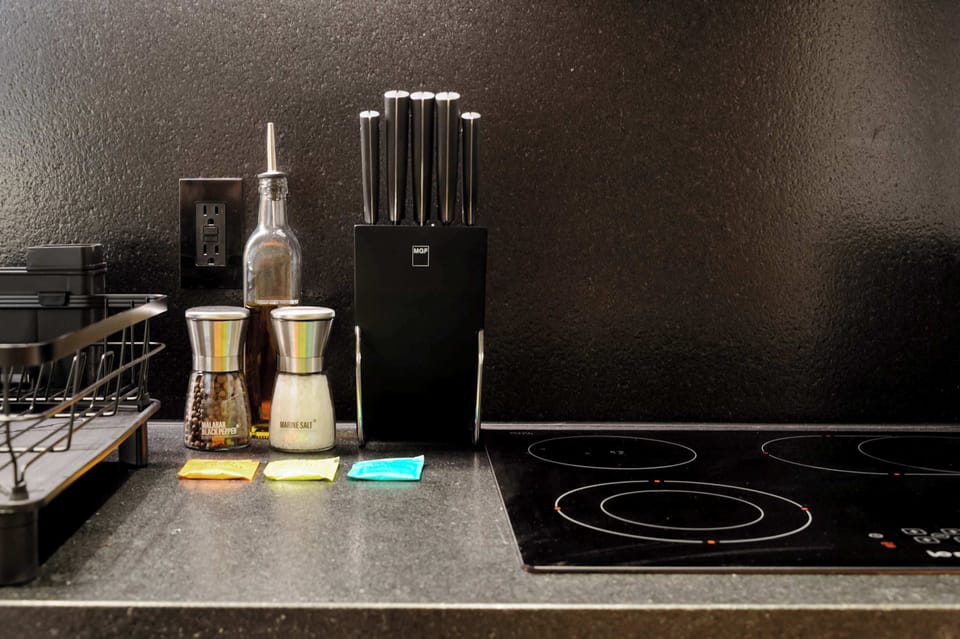 Equipped cooking area with essentials for your stay.
