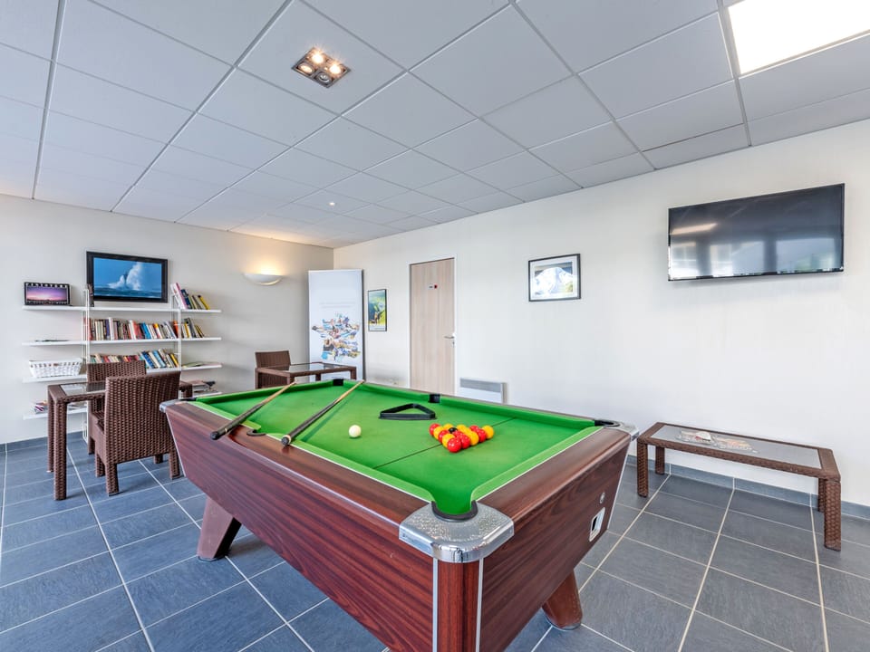 Enjoy our pool table with your family and friends. 