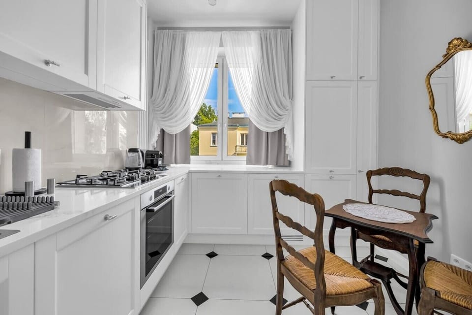 Bright Elegant Kitchen with Coffee Machine & Large Window | Book Now with RENTUJEMY.COM