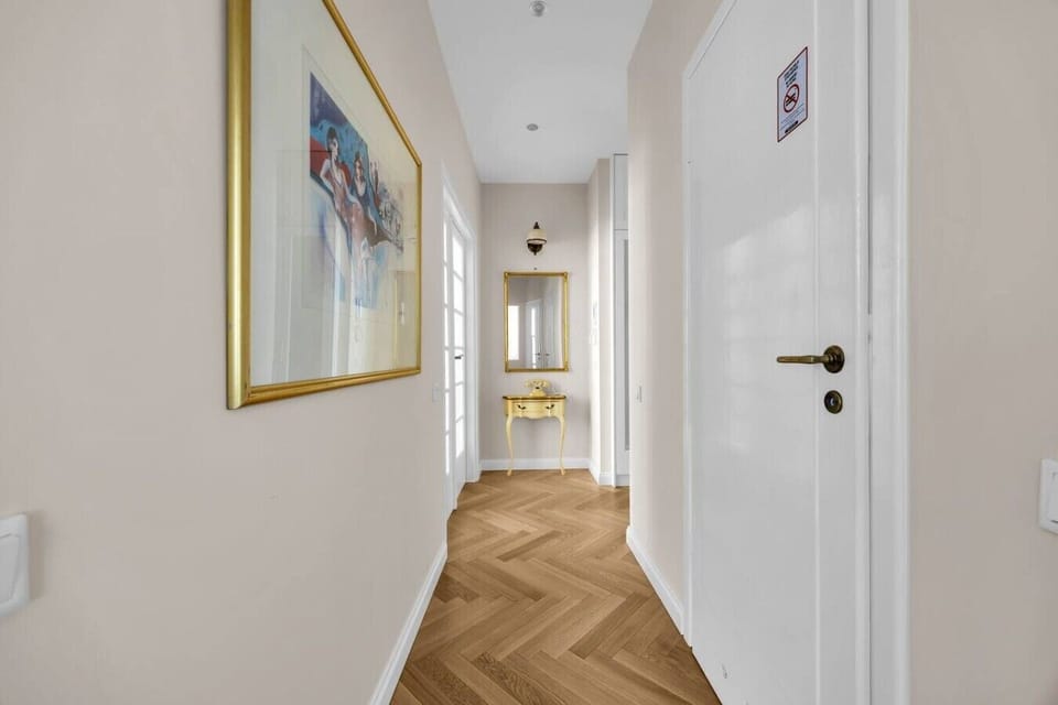 Bright Hallway Connecting the Elegant Living Spaces | Book Now with RENTUJEMY.COM