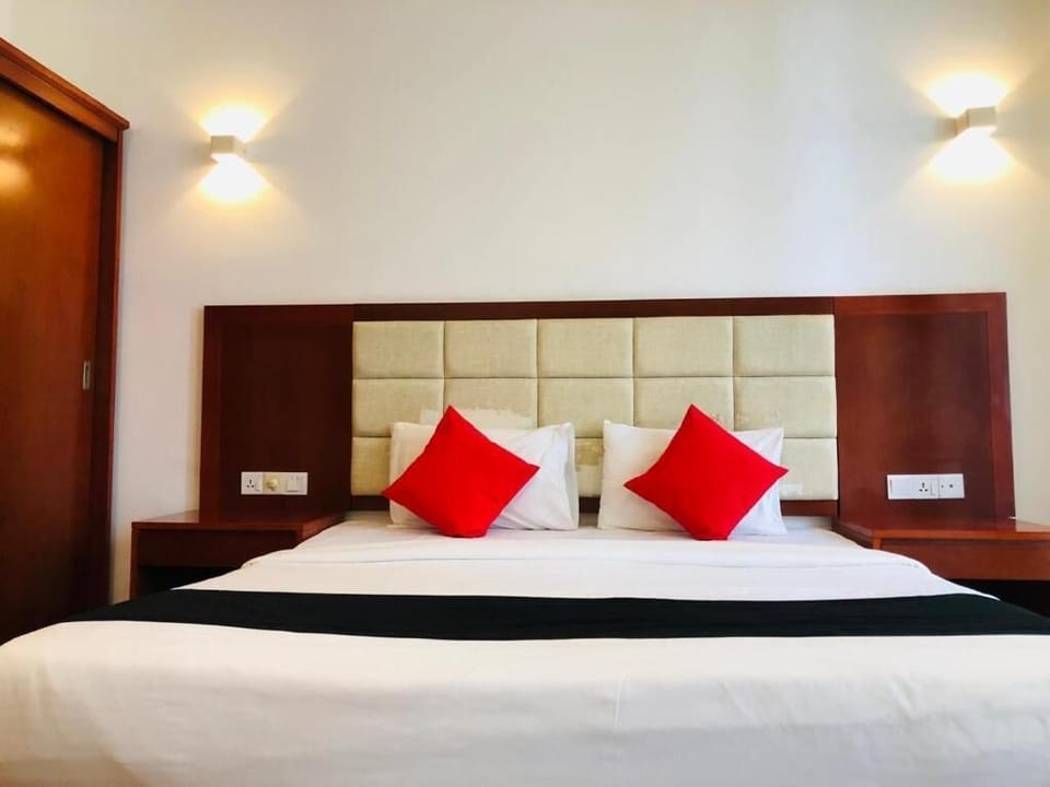 Deluxe Double Room, Balcony, Pool View | In-room safe, laptop workspace, iron/ironing board, free WiFi