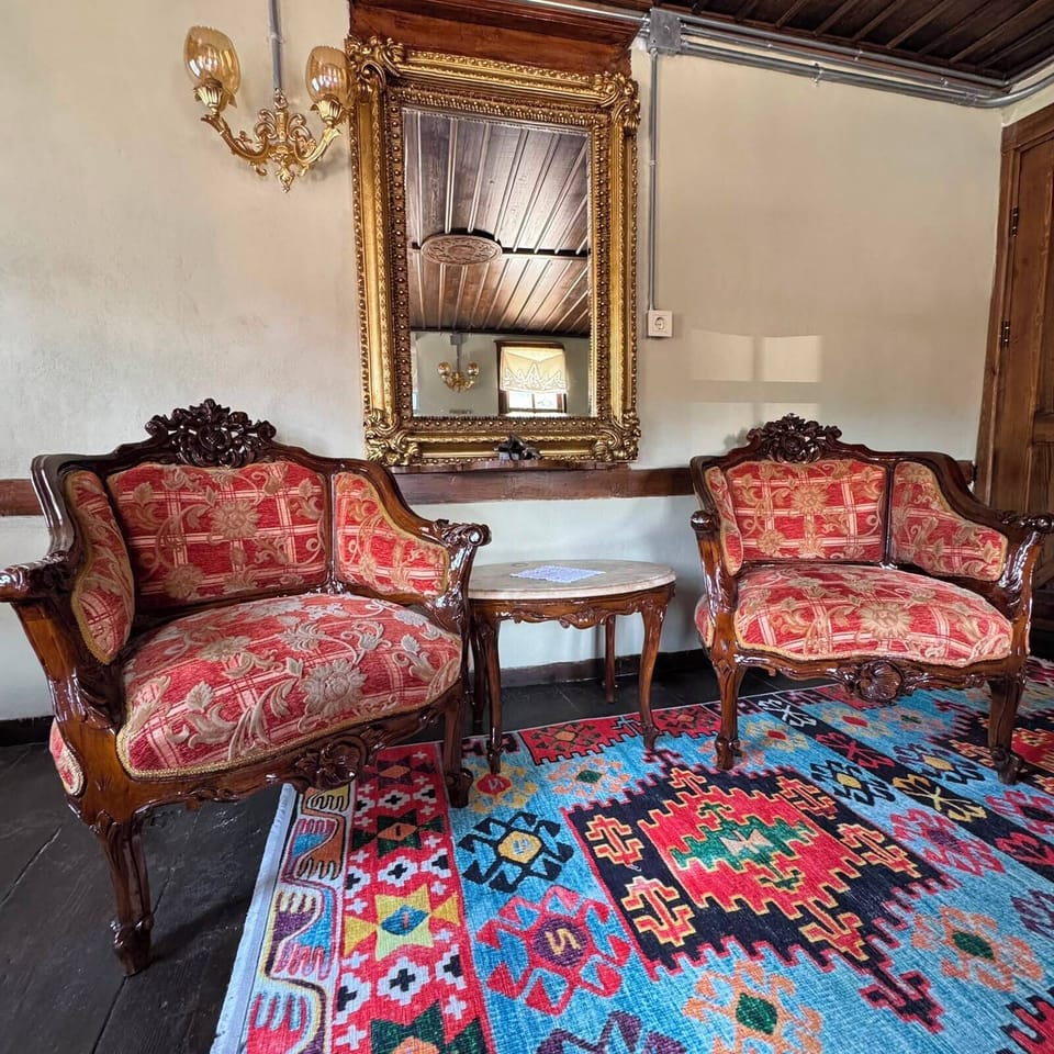 Superior Double or Twin Room, City View | Living area | Fireplace