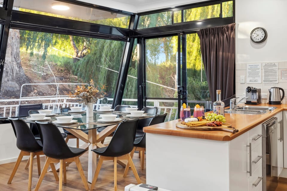 Boats and Bedzzz - Moving Waters Houseboat (Moored Accommodation) | Private kitchen | Full-size fridge, microwave, oven, stovetop