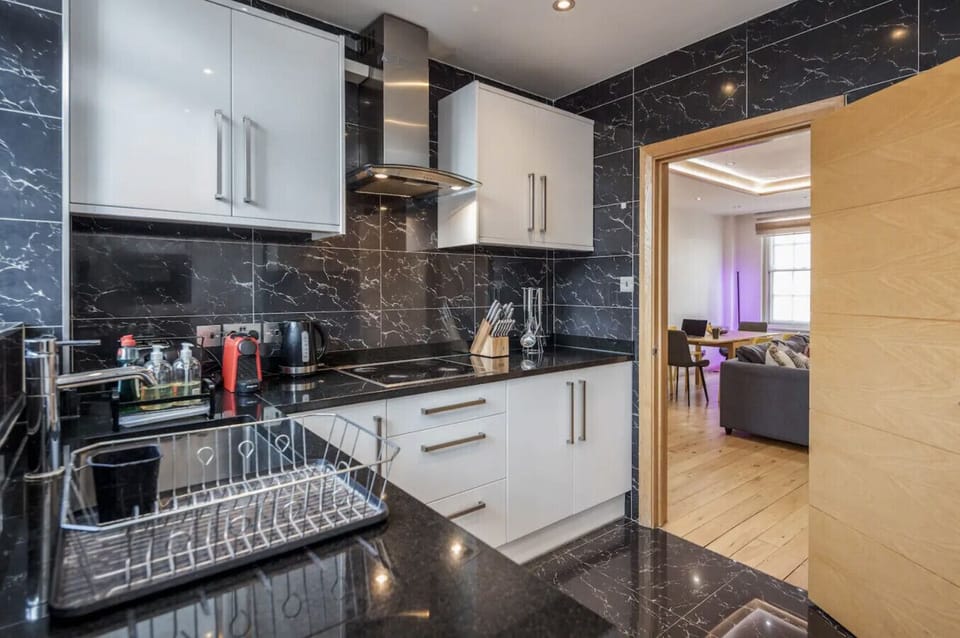 Kitchen with direct access to the living and dining space — open layout ideal for groups who want to stay connected while cooking.