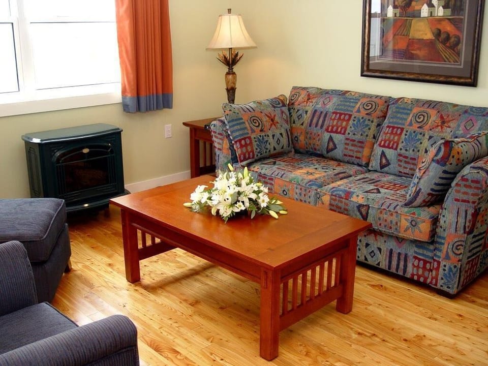 Suite, Ocean View | Living area | Fireplace