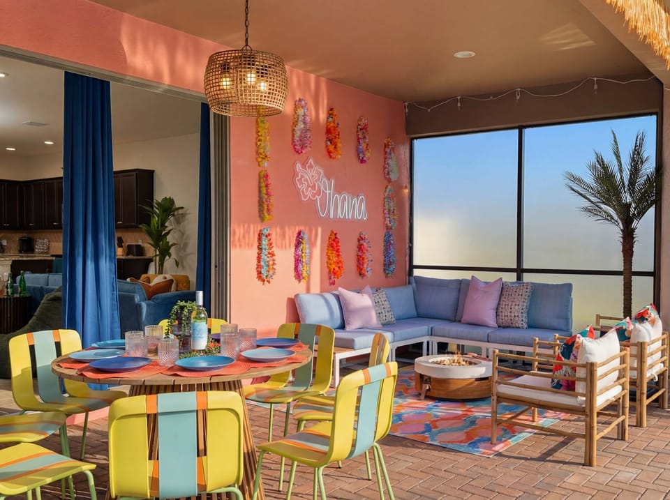 Unwind in the colorful outdoor sitting area by the pool.