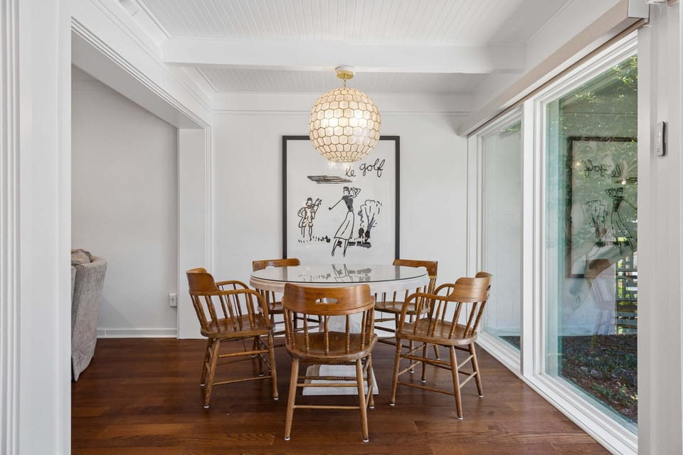 Dining table featuring seating for 5 guests.