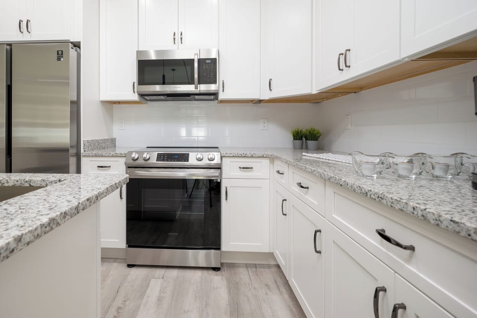 Fully equipped kitchen with appliances—ideal for extended stays and family dining.