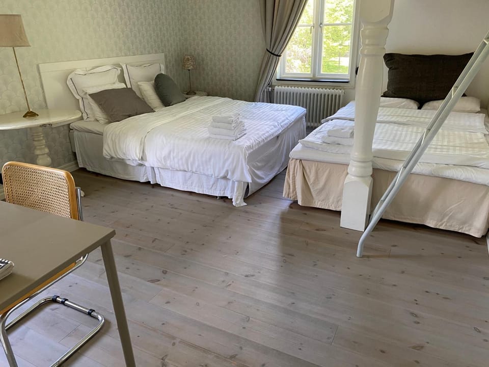 Desk, blackout drapes, iron/ironing board (on request), WiFi (free)
