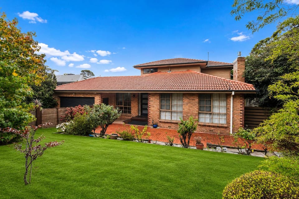 Spacious family home with lush front lawn