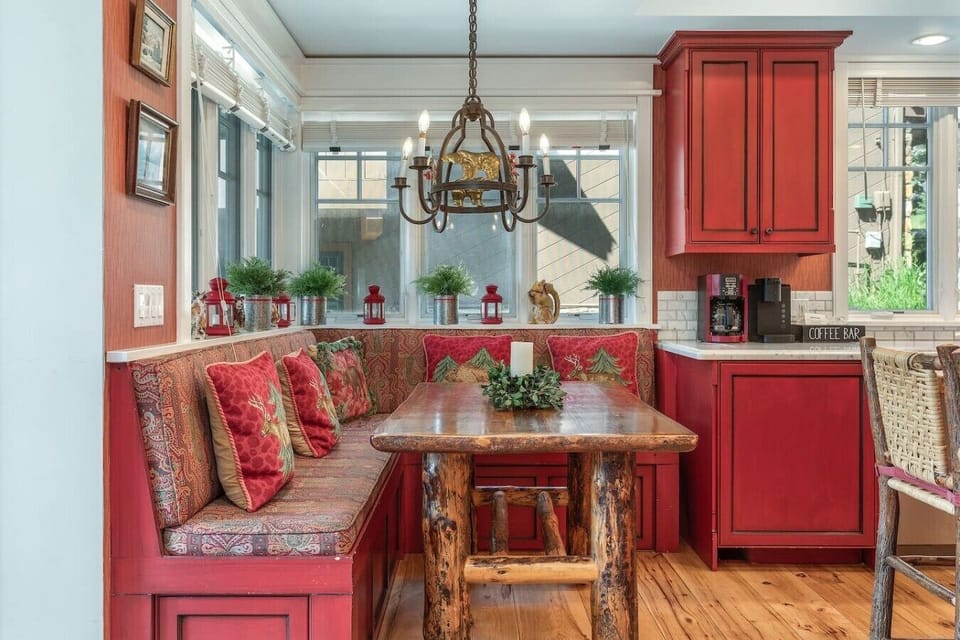 High end, fully equipped kitchen with breakfast nook and bar seating
