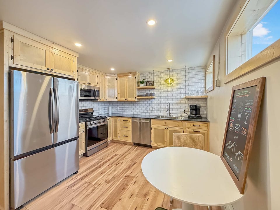 【Kitchen】 Full stainless setup — gas stove, dishwasher, drip coffee, real cookware