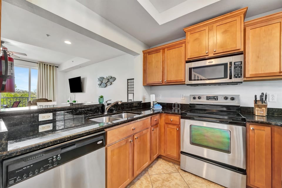 Full kitchen with stainless steel appliances