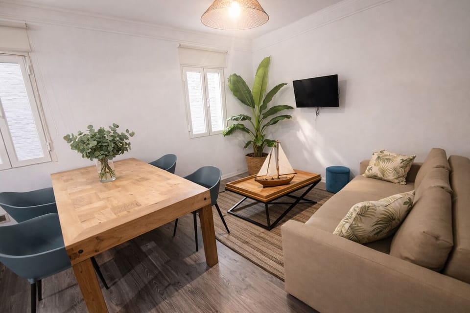 City Apartment, 2 Bedrooms | Living area | 32-inch flat-screen TV with cable channels