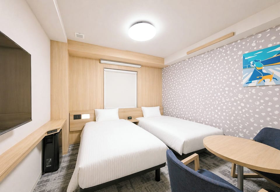 Basic Twin Room, Non Smoking | Down comforters, desk, free WiFi, bed sheets