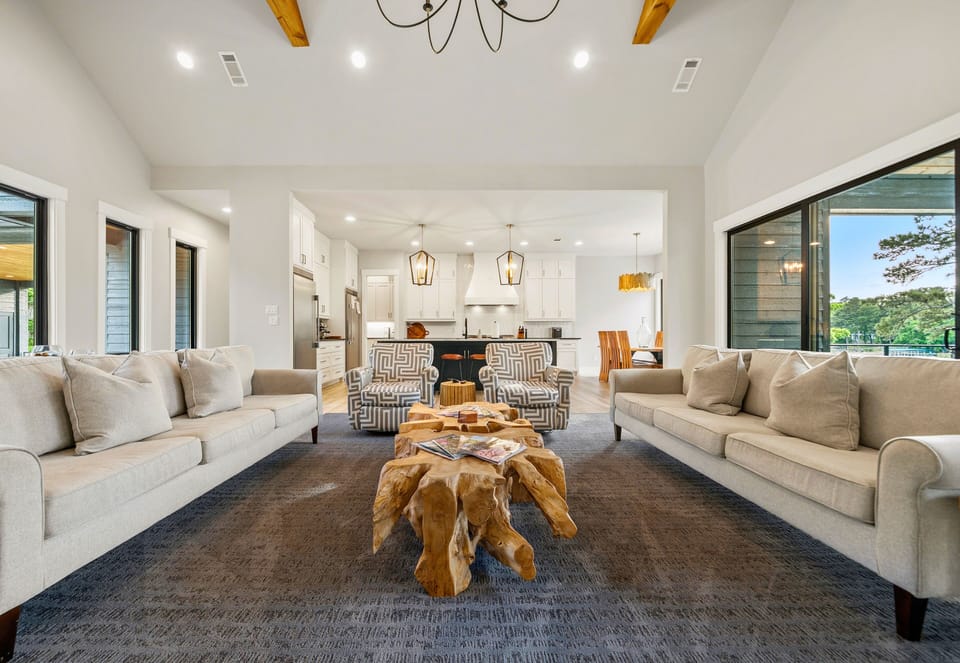 The main living area flows seamlessly into the kitchen and dining spaces, giving everyone room to spread out while still feeling connected.