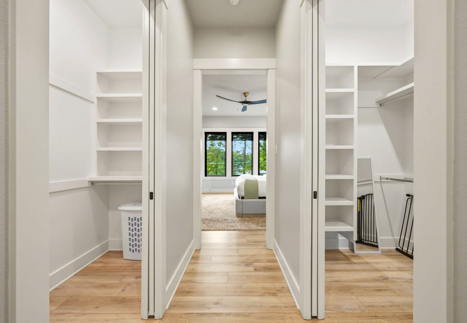 The oversized walk-in closet provides plenty of room for longer stays while keeping everything organized and tucked away.