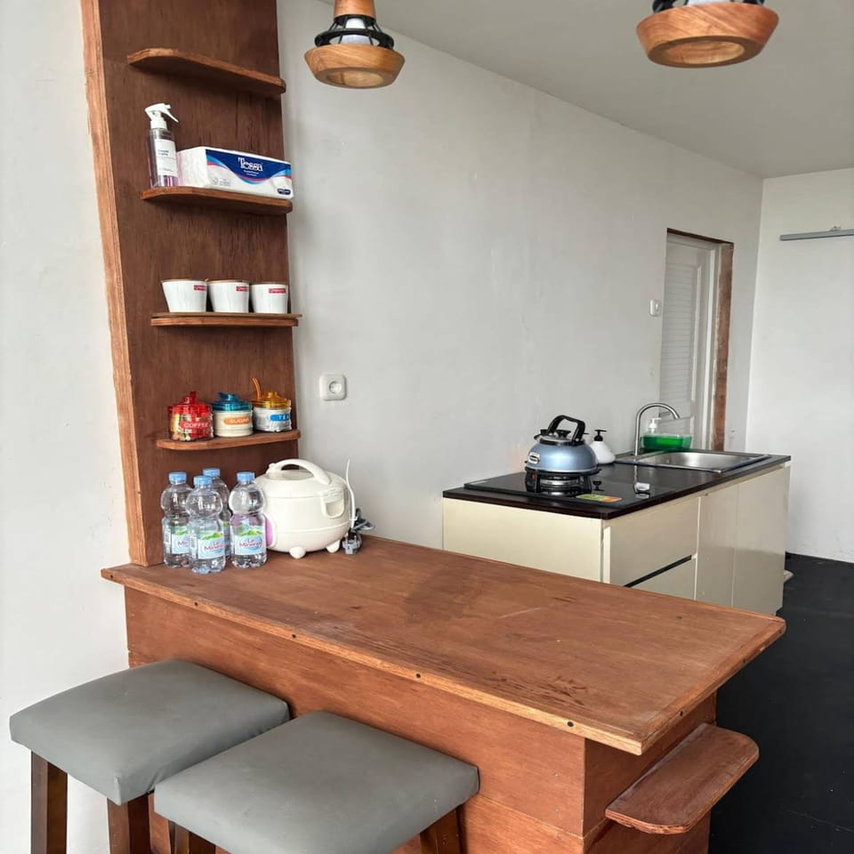 Family Suite | Private kitchen | Coffee/tea maker, mini-fridge, stovetop, dishwasher