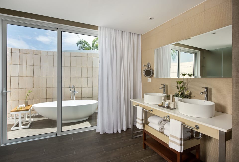 Shower, eco-friendly toiletries, hair dryer, bathrobes