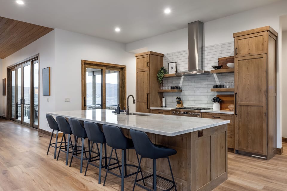 Chef's kitchen · island · bar seating · custom cabinetry