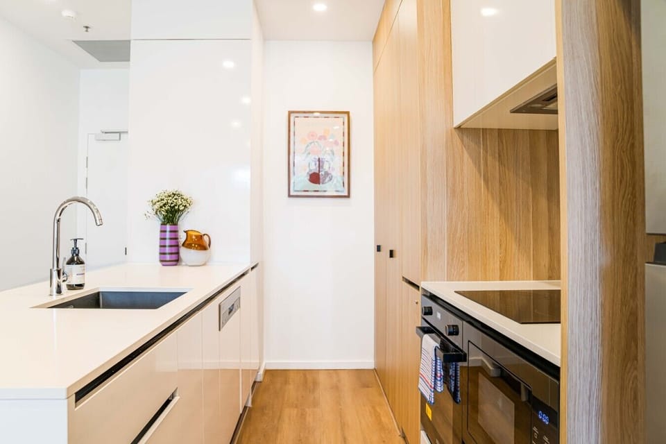 The well-designed kitchen area provides everything you need for easy meal preparation during your stay.