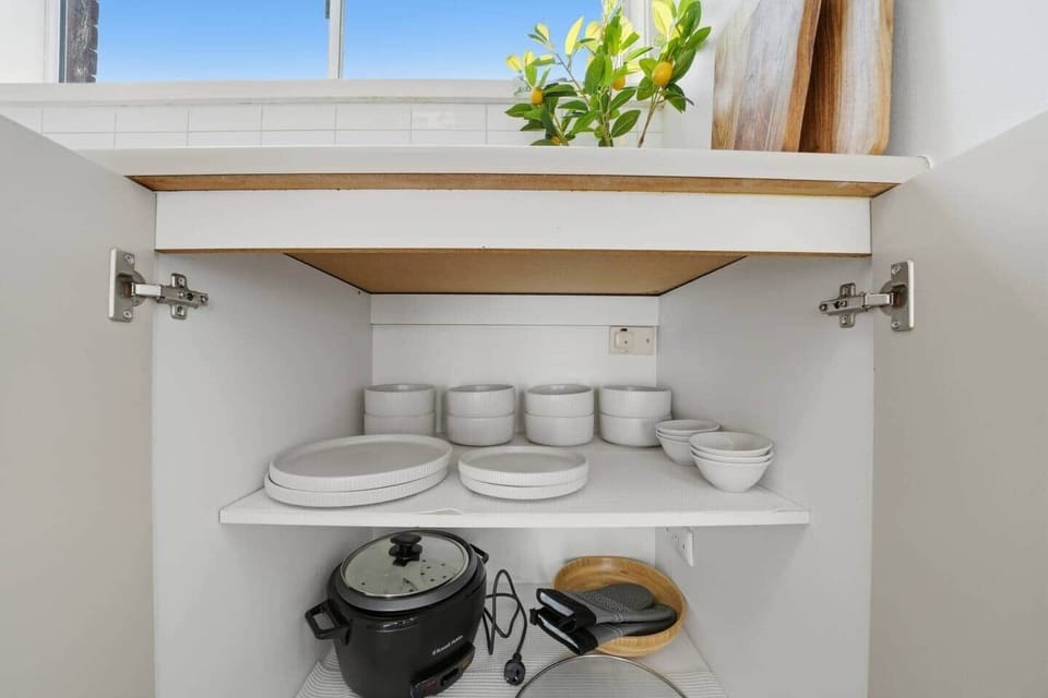 Cook with ease in this stylish kitchen close to Sandy Bay shops and cafes