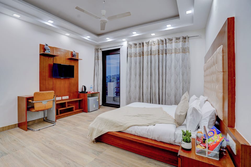 Deluxe Double Room, Balcony, City View | Desk, laptop workspace, free WiFi