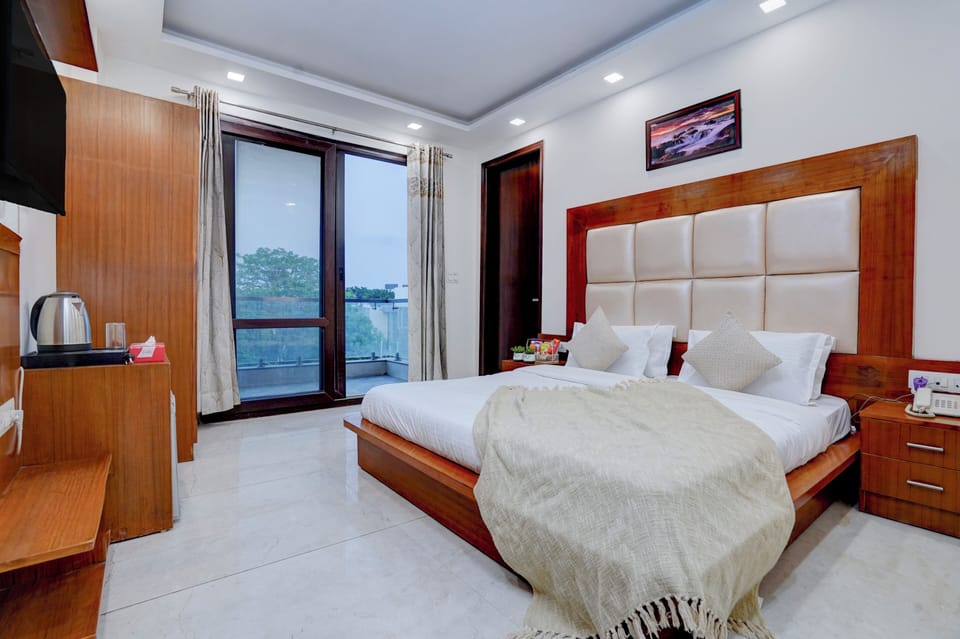 Deluxe Double Room, Balcony, City View | Desk, laptop workspace, free WiFi