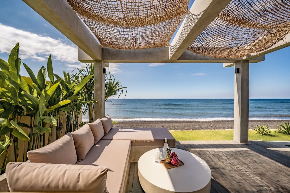 Deluxe Villa, 2 Bedrooms, Patio, Sea View | Living area | 40-inch TV with cable channels