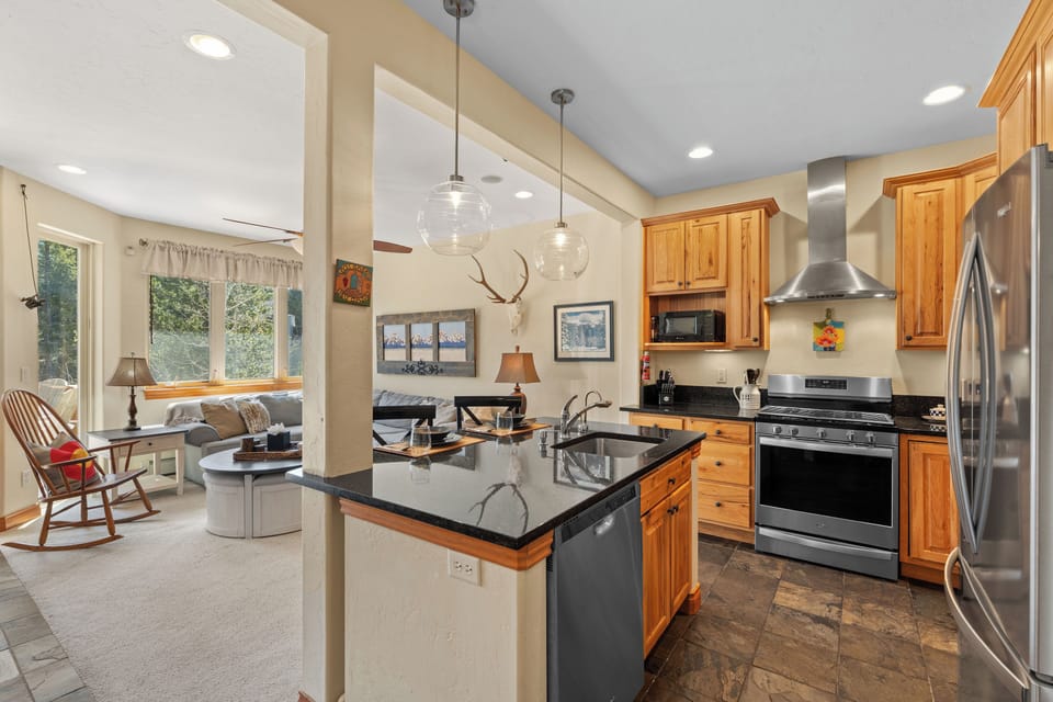 Fully Equipped Kitchen Area with Stainless Steel Appliances