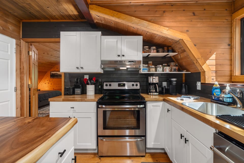 Kitchen is outfitted with an Electric Range