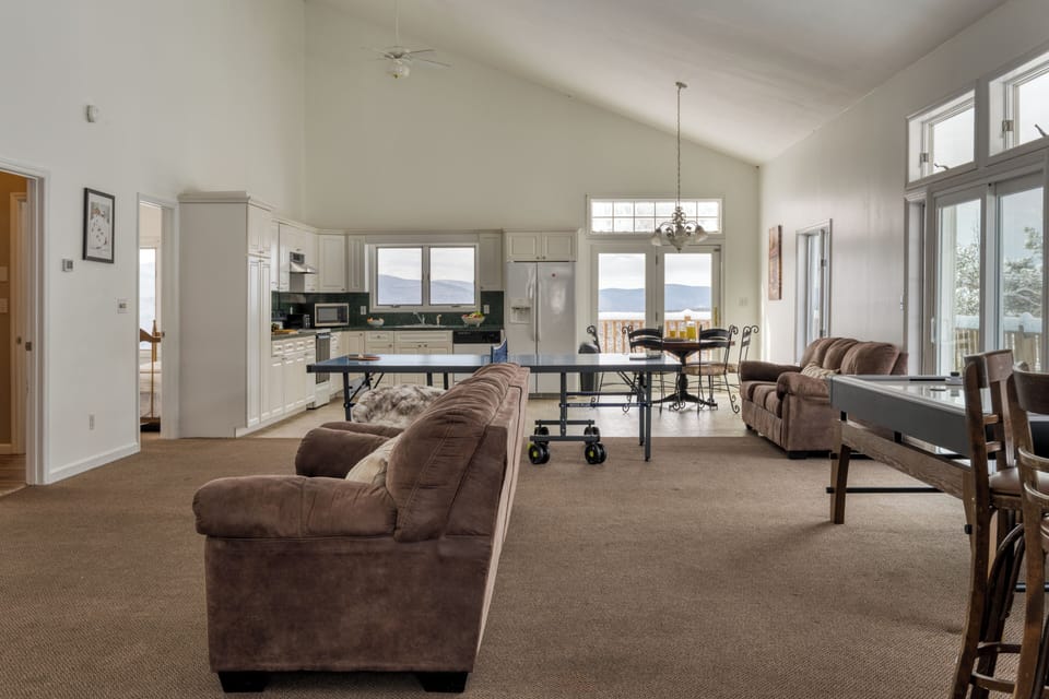 Open-concept floor plan with various games for endless fun.