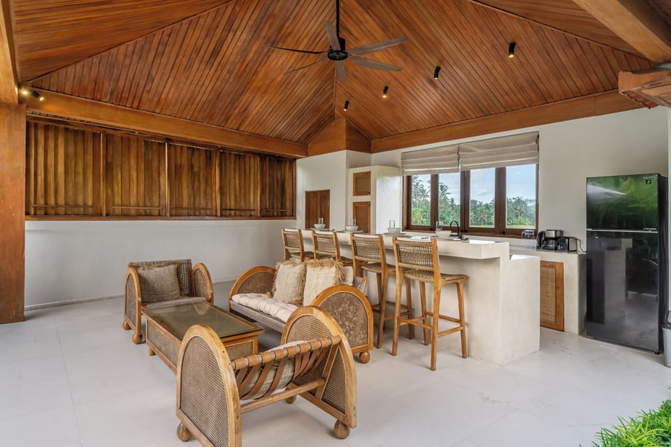 Exclusive Villa, Pool View | Living area | 50-inch Smart TV with digital channels