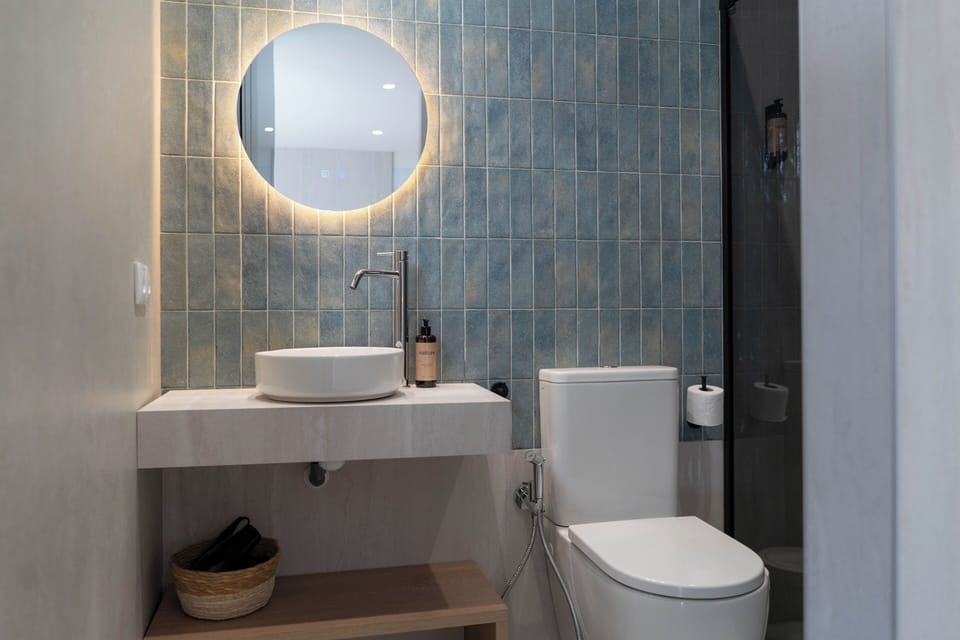 Deluxe Double or Twin Room, Patio | Bathroom | Shower, hair dryer, towels, soap