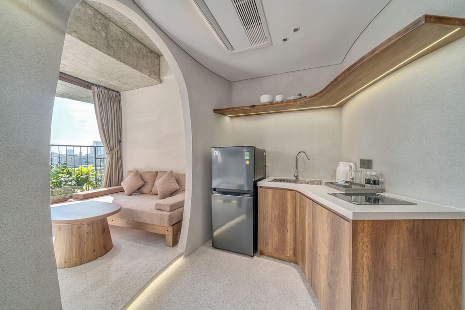 Deluxe Double Room, Kitchenette, City View | Living area | Flat-screen TV