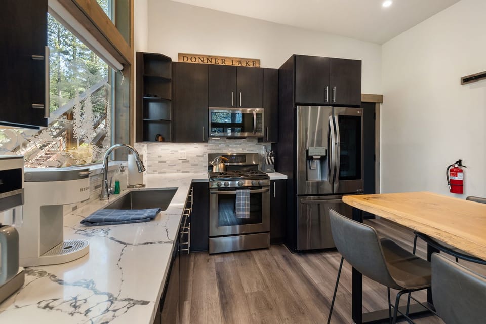 Newly remodeled marble counter and stainless steel appliances