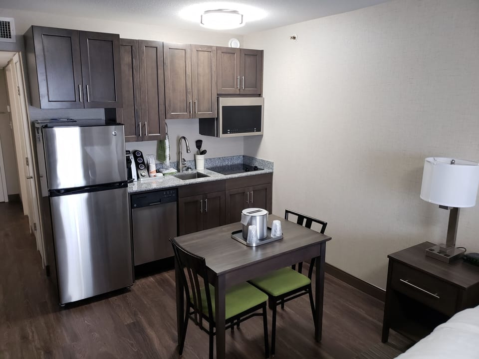 Non Smoking Suite, 1 King Bed, Kitchen | Private kitchenette | Fridge, microwave, coffee/tea maker