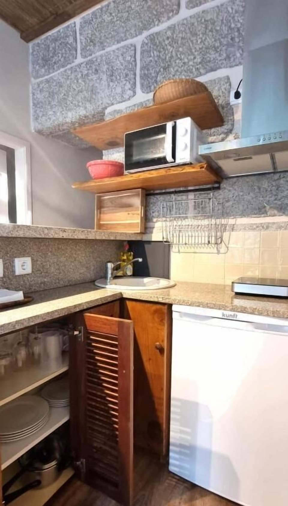 Superior Studio, Partial Lake View | Private kitchen | Microwave, electric kettle, highchair