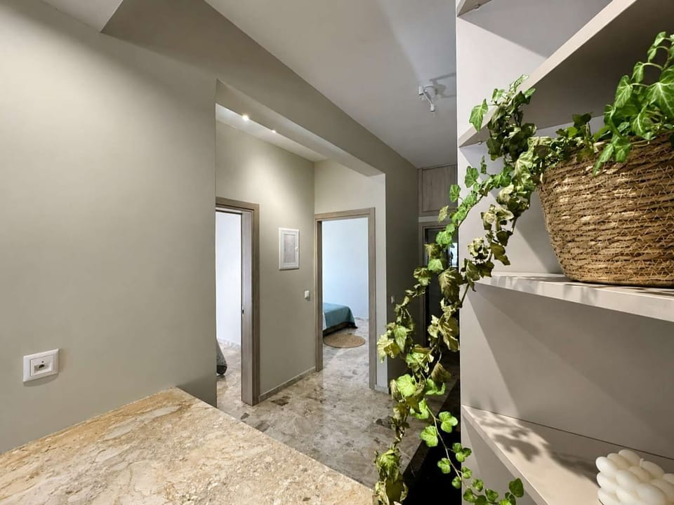 Stylish corridor with decorative greenery accents
