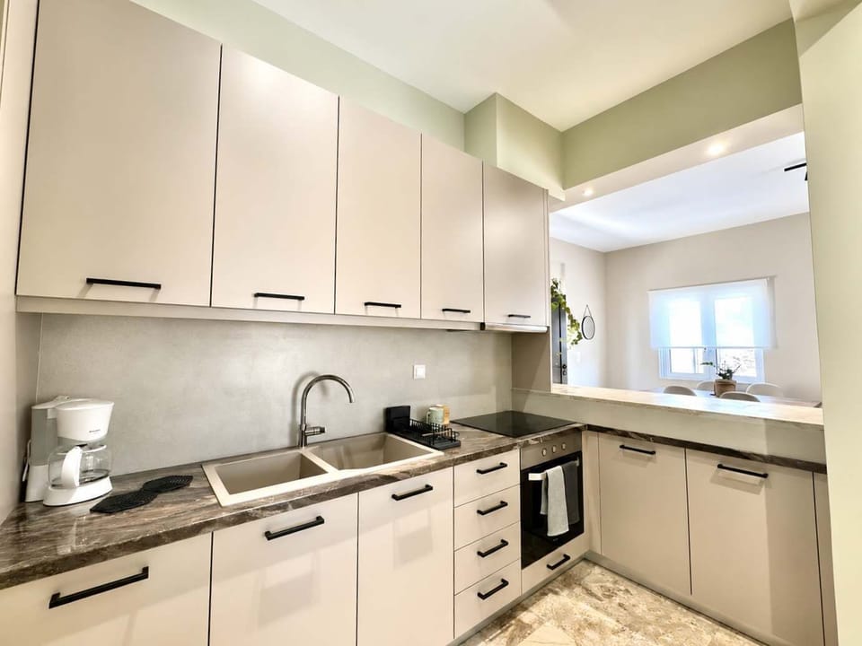 Spacious kitchen with ample storage and natural light