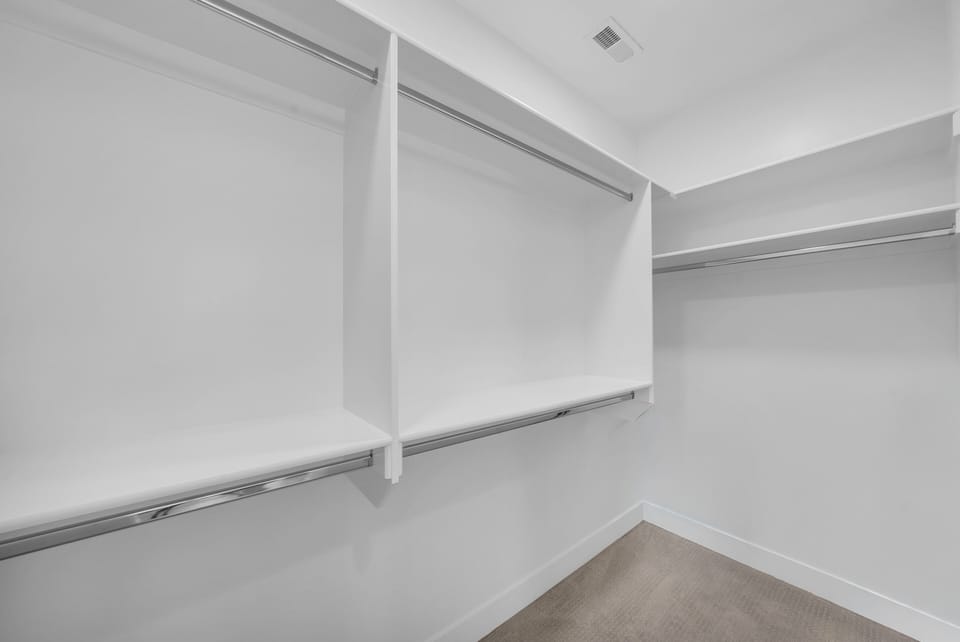 The spacious walk-in closet off the master ensuite gives you plenty of room to unpack and settle in for your stay.