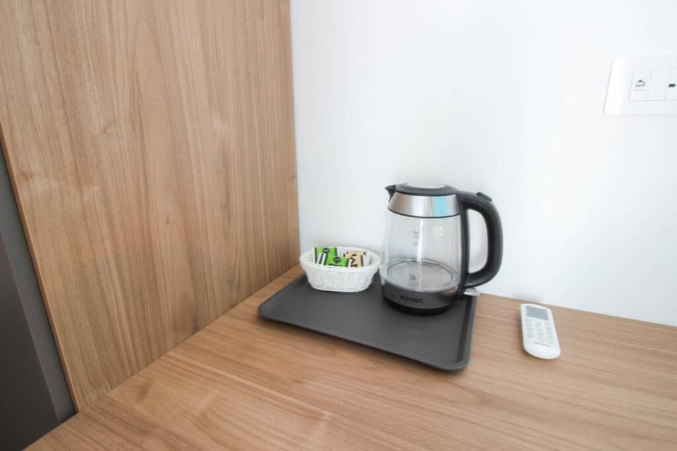 Luxury Triple Room, Balcony | Coffee and/or coffee maker
