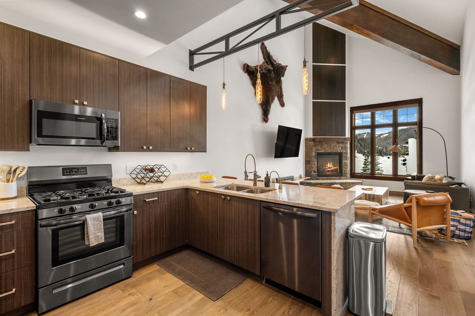 Kitchen: Drip coffee maker, Keurig coffee machine, blender, toaster oven, tableware, main floor
