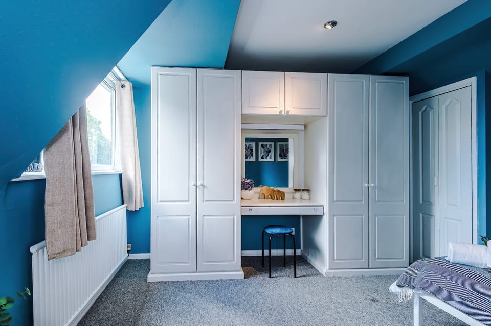 Bedroom 1 features a double bed, built in wardrobes and a dressing table area for you to get ready in the morning. There is plenty of room to unpack and settle in for a good night's sleep!