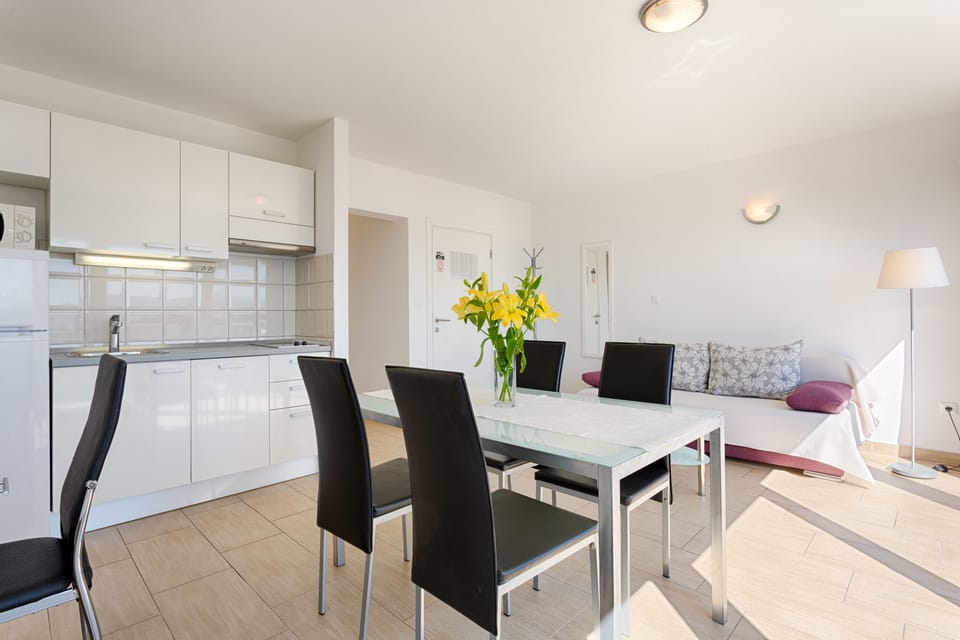 Apartment, Balcony, Sea View | Living area | LCD TV