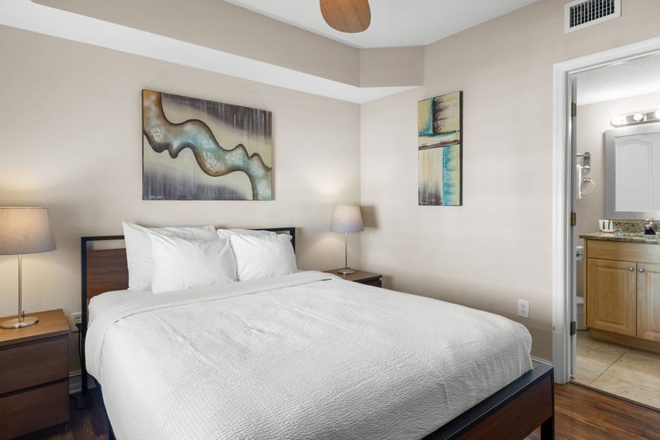 Relax in a beautifully appointed bedroom featuring a cozy king bed and soothing decor.