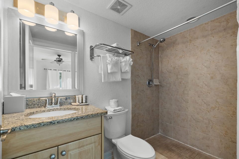 Unwind in a sleek shower with stylish finishes, adding a touch of luxury to your daily routine.