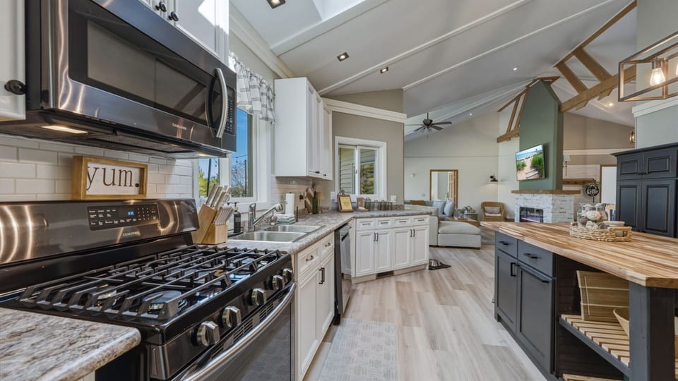 Large, spacious kitchen designed for easy cooking and gathering, with plenty of room to prep meals, share snacks, and enjoy time together.
