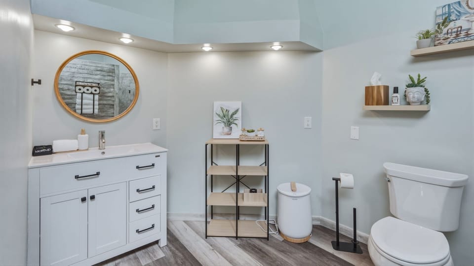 Modern bathroom featuring clean, bright, and functional design, offering a refreshing space to start or end your day.